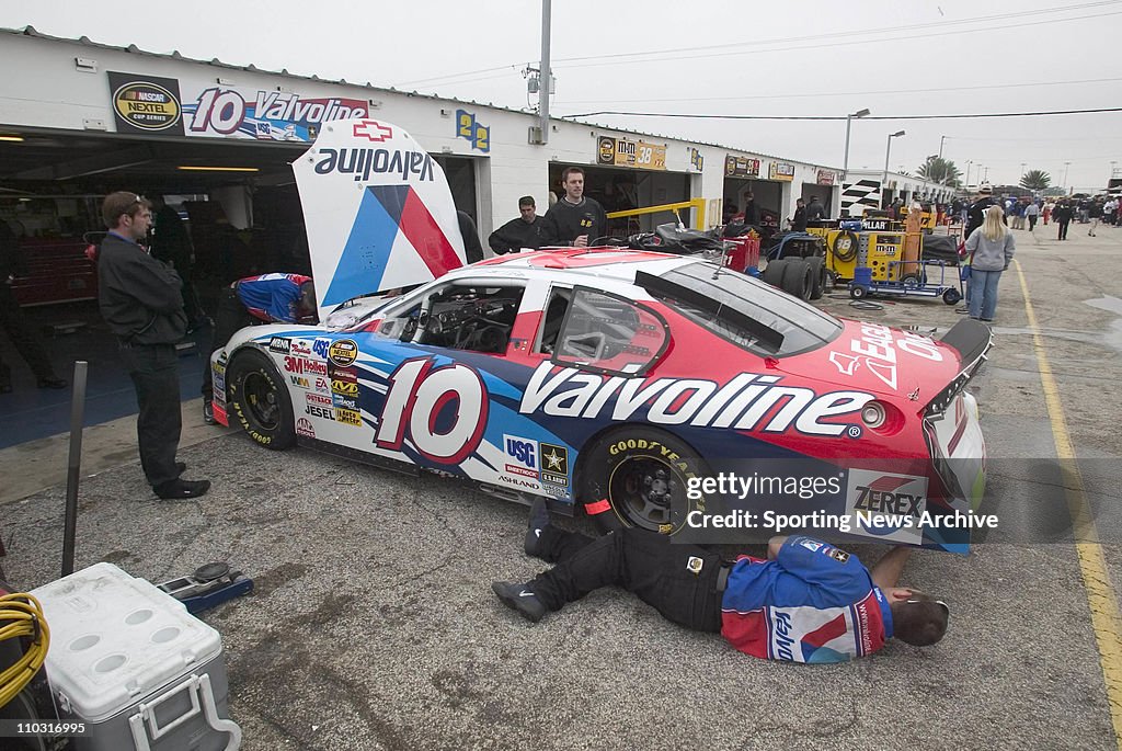 Scott Riggs Crash Scott Riggs' car gets worked on during the practice for the Daytona ...