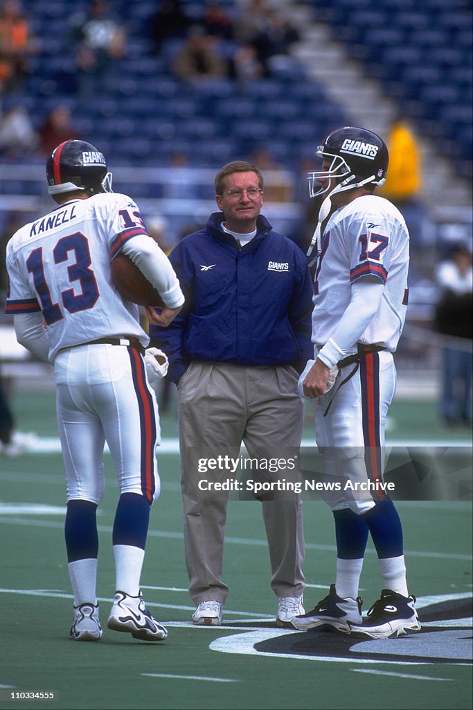 New York Giants Danny Kanell (13), coach Jim Fassel, and Dave Brown (17) on Dec. 7, 1997 at Veterans Stadium in Philadelphia.
