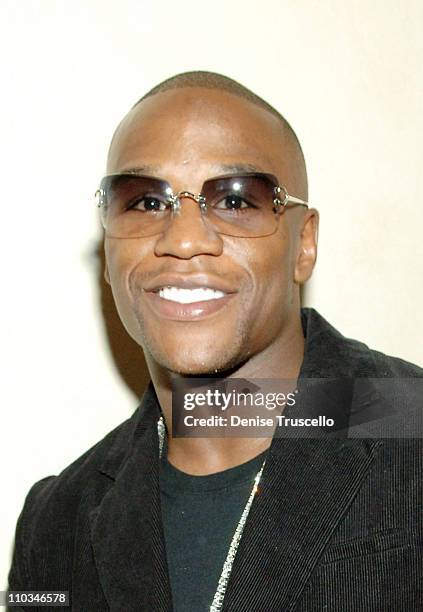 Boxer Floyd Mayweather Jr poses for photos at Gavin Maloof's housewarming party at his private residence on October 25, 2007 in Las Vegas, Nevada.