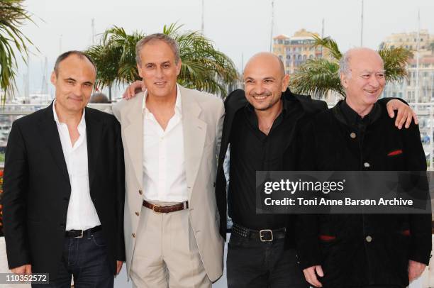 Philippe Val, Daniel Leconte, director, Richard Malka and artist Georges Wolinski attend the C'est Dur D'etre Aime Par Des Cons Photocall at the...