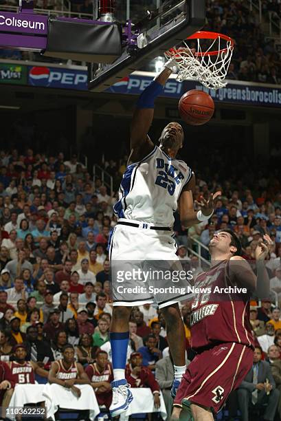 Mar 12, 2006; Greensboro, NC, USA; Duke Shelden Williams and Boston College John Oates during the final of the ACC Men's Basketball Tournament,...