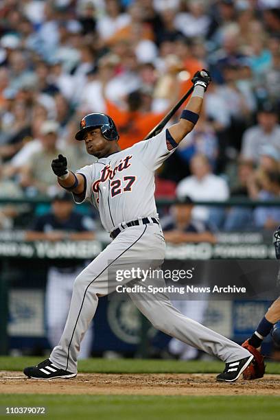 Jul 07, 2006; Seattle, WA, USA; The Detroit Tigers CRAIG MONROE hits a home run against the Seattle Mariners at Safeco Field. The Tigers won 6-1.