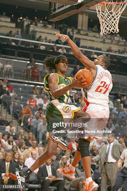 Nov 10, 2006; Charlotte, NC, USA; Seattle Supersonics CHRIS WILCOX against the Charlotte Bobcats OTHELLA HARRINGTON at the Charlotte Bobcats Arena....