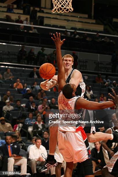 Dec 06, 2006; Charlotte, NC, USA; San Antonio Spurs MATT BONNER against Charlotte Bobcats OTHELLA HARRINGTON on Dec. 6 at the Charlotte Bobcats Arena...