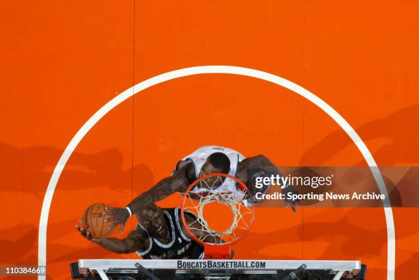 Dec 06, 2006; Charlotte, NC, USA; San Antonio Spurs FRANCISCO ELSON against Charlotte Bobcats GERALD WALLACE on Dec. 6 at the Charlotte Bobcats Arena...