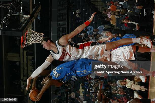 Mar 12, 2007 - Charlotte, NC, USA - Orlando Magic TREVOR ARIZA against Charlotte Bobcats PRIMOZ BREZEC on March 12 at the Charlotte Bobcats Arena in...