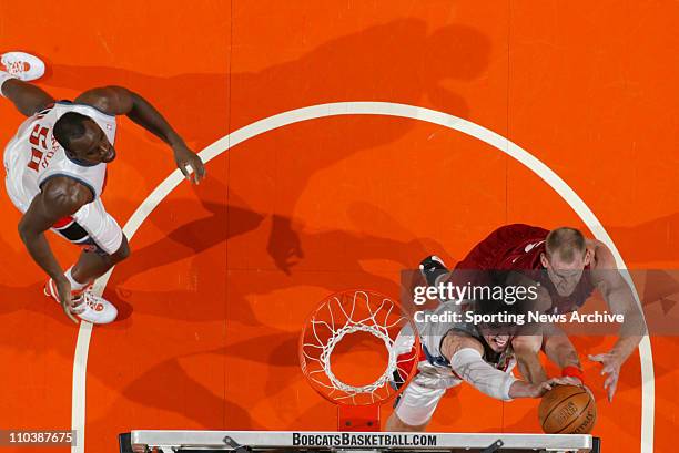 Apr 10, 2007 - Charlotte, NC, USA - The Miami Heat MICHAEL DOLEAC against the Charlotte Bobcats PRIMOZ BREZEC at the Charlotte Bobcats Arena. The...