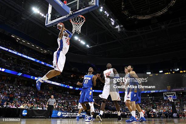 Alex Tyus of the Florida Gators dunks against the UC Santa Barbara Gauchos during the second round of the 2011 NCAA men's basketball tournament at...