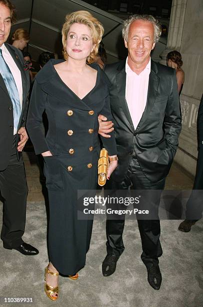 Catherine Deneuve and Gilles Bensimon during 2005 CFDA Fashion Awards - Inside at New York Public Library in New York City, New York, United States.