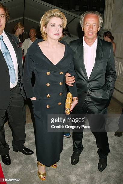 Catherine Deneuve and Gilles Bensimon during 2005 CFDA Fashion Awards - Inside at New York Public Library in New York City, New York, United States.