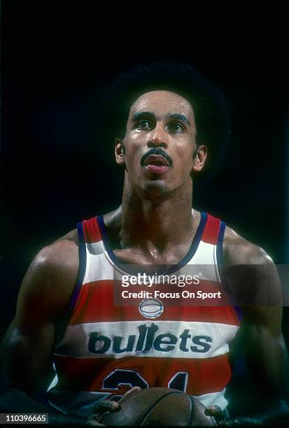 Dave Bing of the Washington Bullets stands at the free-throw line looking to shoot during an NBA basketball game circa 1975 at the Baltimore Civic...