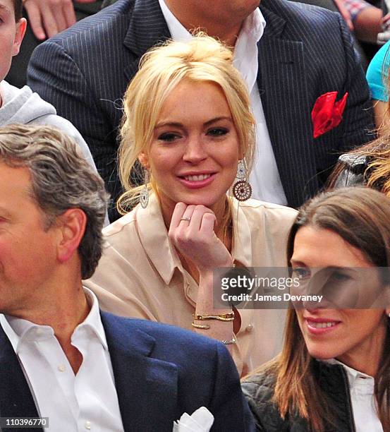 Lindsay Lohan attends the Memphis Grizzlies vs New York Knicks game at Madison Square Garden on March 17, 2011 in New York City.