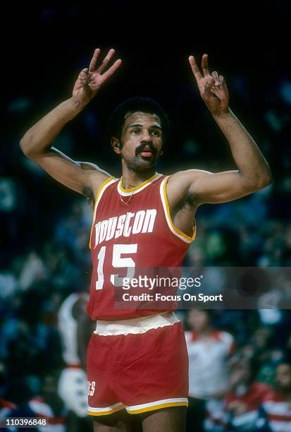 John Lucas of the Houston Rockets calls a play to teammates against the Washington Bullets during an NBA basketball game circa 1977 at the Baltimore...