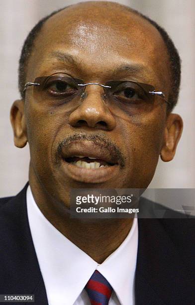 Former President of Haiti Jean-Bertrand Aristide reads a statement, which he prepared in Zulu, at Lanseria airport on March 17, 2011 in Johannesburg,...