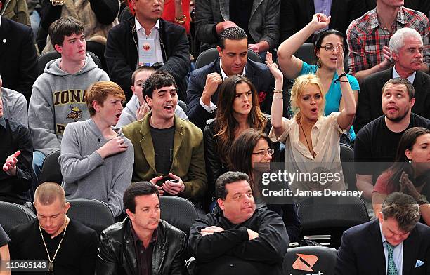 Cody Lohan, Michael Lohan Jr., Ali Lohan and Lindsay Lohan attend the Memphis Grizzlies vs New York Knicks game at Madison Square Garden on March 17,...