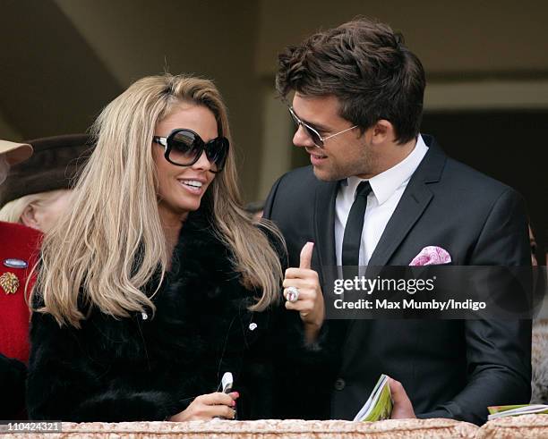 Katie Price and Leandro Penna watch the Gold Cup race from the balcony of the Royal Box as they attend day 4 'Gold Cup Day' of the Cheltenham...