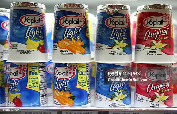 Containers of Yoplait yogurt sit on the shelf at Santa Venetia Market on March 18, 2011 in San Rafael, California. General Mills announced today that...