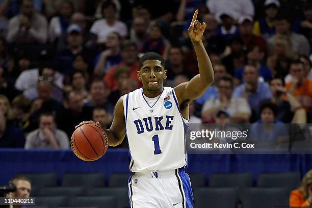 Kyrie Irving of the Duke Blue Devils calls a play in the first half while taking on the Hampton Pirates during the second round of the 2011 NCAA...