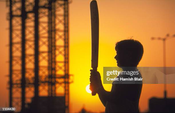 General scenes of a boy playing cricket in the streets during the Australian Cricket Tour of India, in Mumbai, India. Mandatory Credit: Hamish...