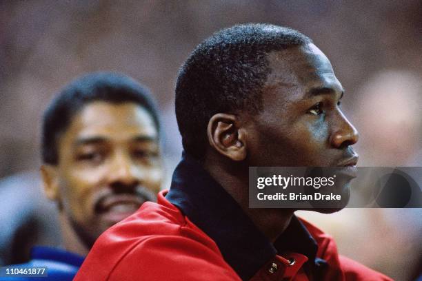 Michael Jordan of the Chicago Bulls sits on the bench against the Portland Trail Blazers during a game played at Memorial Coliseum in 1987 in...