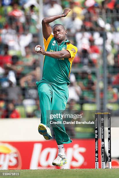 Lonwabo Tsotsobe of South Africa bowls during the ICC World Cup Cricket Group B match between Bangladesh and South Africa at Shere-e-Bangla National...