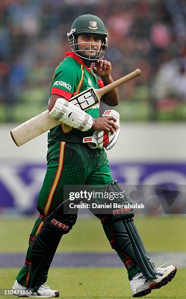 Imrul Kayes of Bangladesh walks back to the pavillion after being dismissed by Lonwabo Tsotsobe of South Africa during the ICC World Cup Cricket...