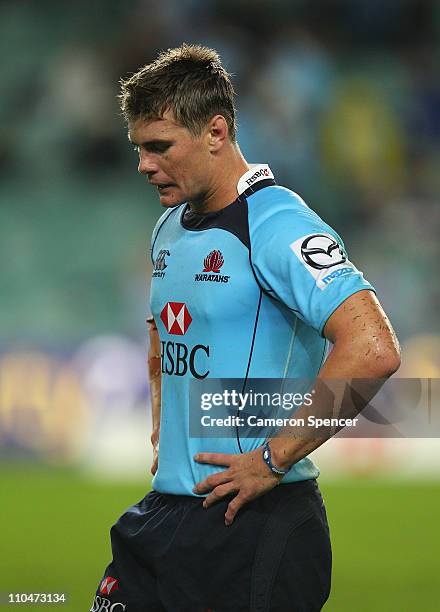 Berrick Barnes of the Waratahs looks dejected after losing the round five Super Rugby match between the Waratahs and the Cheetahs at Sydney Football...