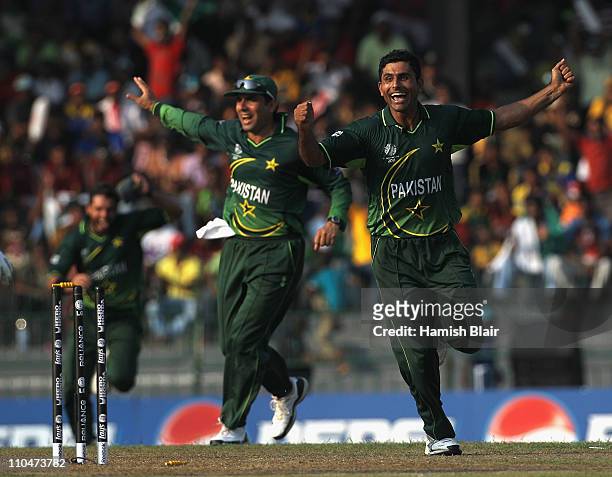 Abdul Razzaq of Pakistan celebrates the wicket of Michael Clarke of Australia during the 2011 ICC World Cup Group A match between Australia and...