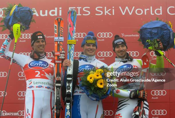 Giuliano Razzoli of Italy takes 1st place, Mario Matt of Austria takes 2nd place, Felix Neureuther of Germany takes 3rd place during the Audi FIS...