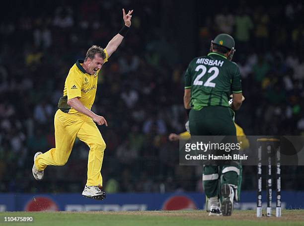 Brett Lee of Australia celebrates after taking the wicket of Misbah-ul-Haq of Pakistan during the 2011 ICC World Cup Group A match between Australia...