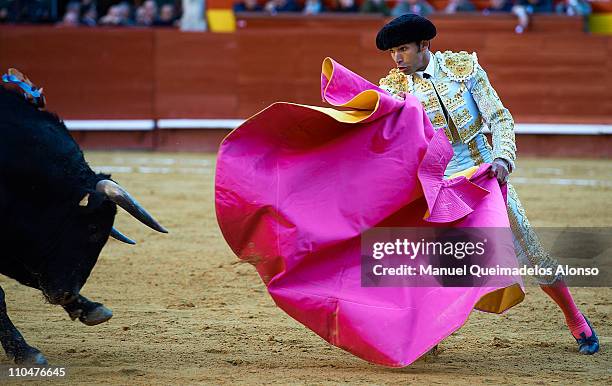 Spanish bullfighter Cayetano Rivera performs during a bullfight at the Plaza Valencia bullring on March 18, 2011 in Valencia, Spain.
