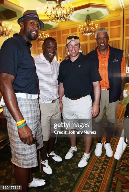 Retired NBA player Alonzo Mourning, NFL player Terry Kirby, retired NFL player Jay Fielder, and the legendary Julius “Dr. J” Erving attend Jazz in...