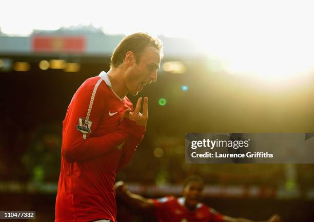 Dimitar Berbatov of Manchester United celebrates scoring the winning goal in the dying minutes during the Barclays Premier League match between...