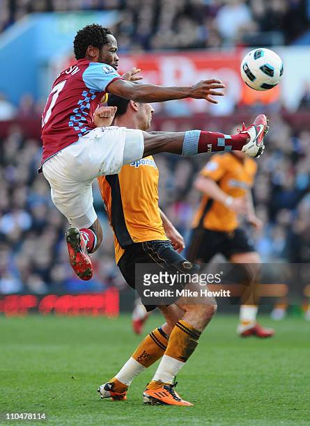 Jean Makoun of Aston Villa challenges Nenad Milijas of Wolves during the Barclays Premier League match between Aston Villa and Wolverhampton...