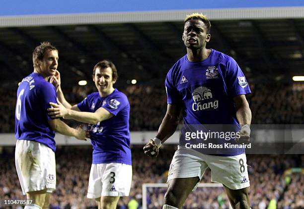 Louis Saha of Everton celebrates after scoring his team's 2-0 goal during the Barclays Premier League match between Everton and Fulham at Goodison...