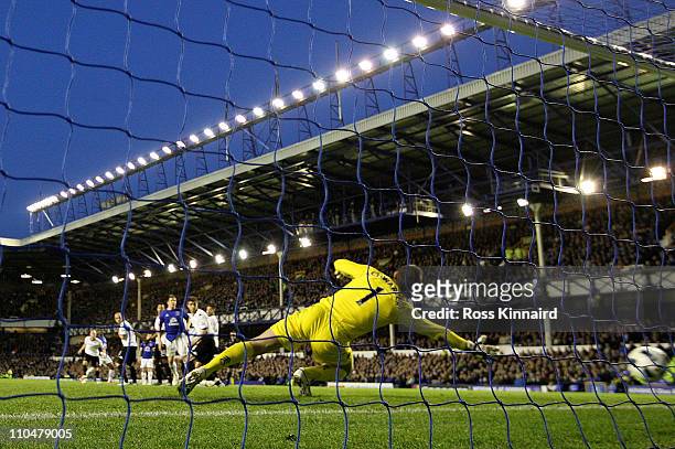 Goalkeeper Mark Schwarzer of Fulham is unable to stop Louis Saha of Everton scoring his team's 2-0 goal during the Barclays Premier League match...