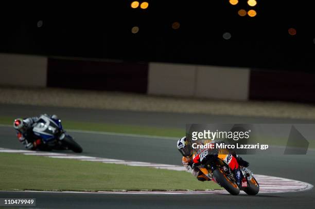 Dani Pedrosa of Spain and Repsol Honda Team heads down a straight during the qualifying practice at Losail Circuit on March 19, 2011 in Doha, Qatar.