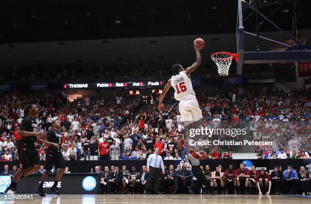 Kawhi Leonard of the San Diego State Aztecs dunks against the Temple Owls during the third round of the 2011 NCAA men's basketball tournament at...