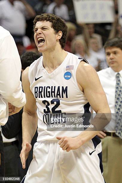 Jimmer Fredette of the Brigham Young Cougars celebrates after a play against the Gonzaga Bulldogs during the third round of the 2011 NCAA men's...