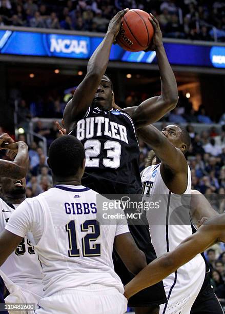 Butler forward Khyle Marshall pulls down a rebound in traffic during second-half action against Pittsburgh in the third round of the 2011 NCAA Men's...