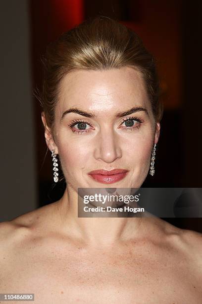 Charity ambassador and host Kate Winslet arrives at the Cardboard Citizens Gala Fundraising Dinner wearing a dress by french couture house Max Chaoul...