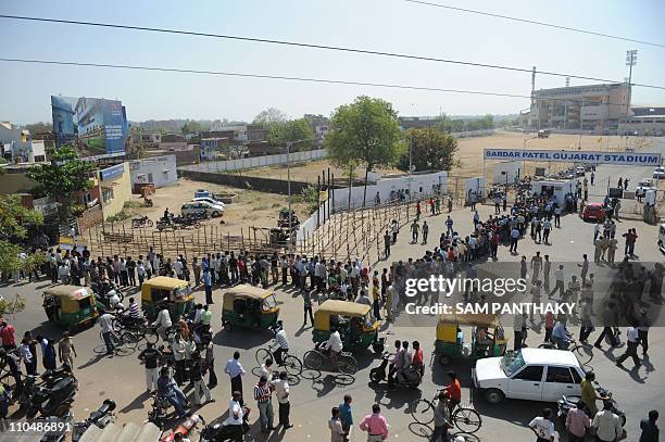 Indian cricket fans wait in line to buy tickets at The Sardar Patel Stadium, Motera -the venue of the second quarterfinal match of Cricket World Cup...