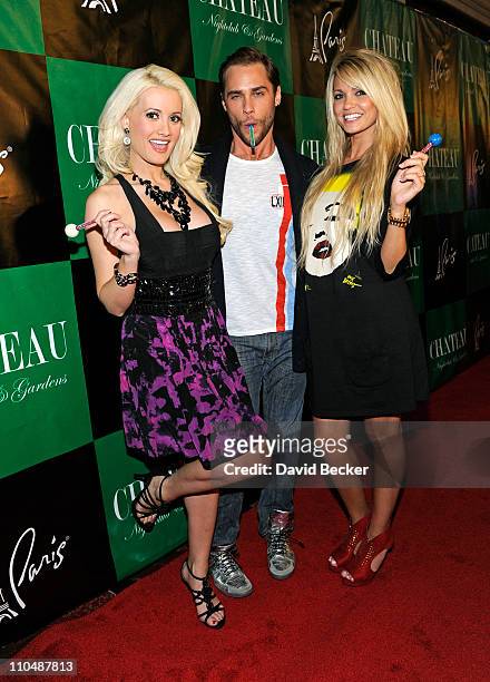 Television personality and model Holly Madison, singer Josh Strickland and television personality Angel Porrino arrive at the Chateau Nightclub &...