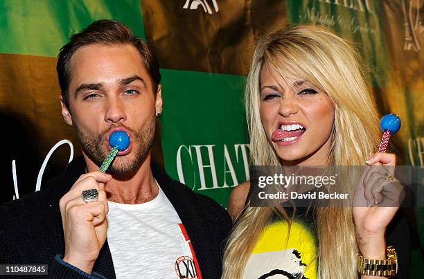 Singer Josh Strickland and television personality Angel Porrino arrive at the Chateau Nightclub & Gardens at Paris Las Vegas on March 19, 2011 in Las...