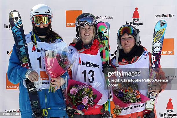 Sarah Burke of Canada takes 1st place, Devin Logan of USA takes 2nd place, Anais Caradeux of France takes 3rd place during the FIS Freestyle World...