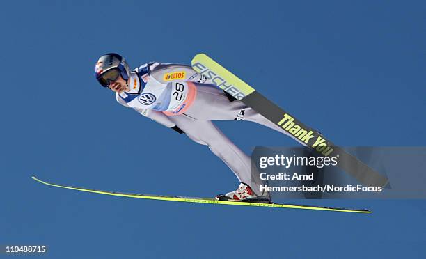 Adam Malysz of Poland competes in his last world cup competition with a "good bye ski" during the Ski Flying Individual Competition in the FIS World...