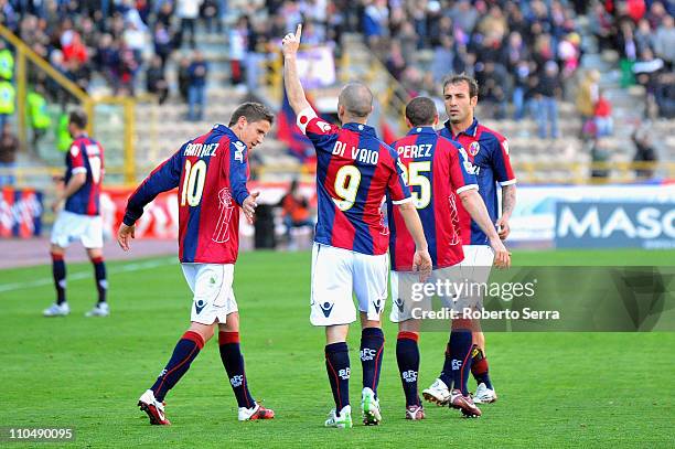 Marco Di Vaio, captain of Bologna celebrates his opening goal with Gaston Ramirez and team-mates during the Serie A match between Bologna FC and...