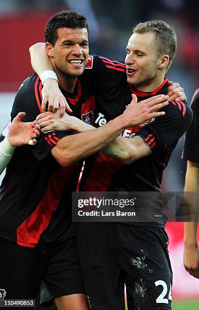 Michael Ballack of LEverkusen celebrates with team mate Michal Kadlec after winning the Bundesliga match between Bayer Leverkusen and FC Schalke 04...