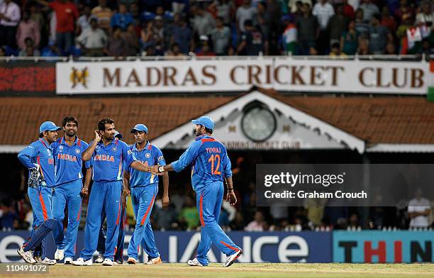 India players celebrate the wicket of Ramanesh Sarwan of West Indies during the Group B ICC World Cup match between India and West Indies at M. A....