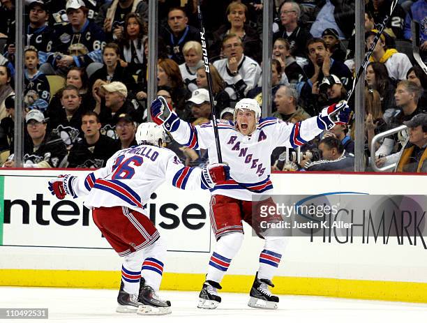 Ryan Callahan of the New York Rangers celebrates his game winning goal against the Pittsburgh Penguins at Consol Energy Center on March 20, 2011 in...
